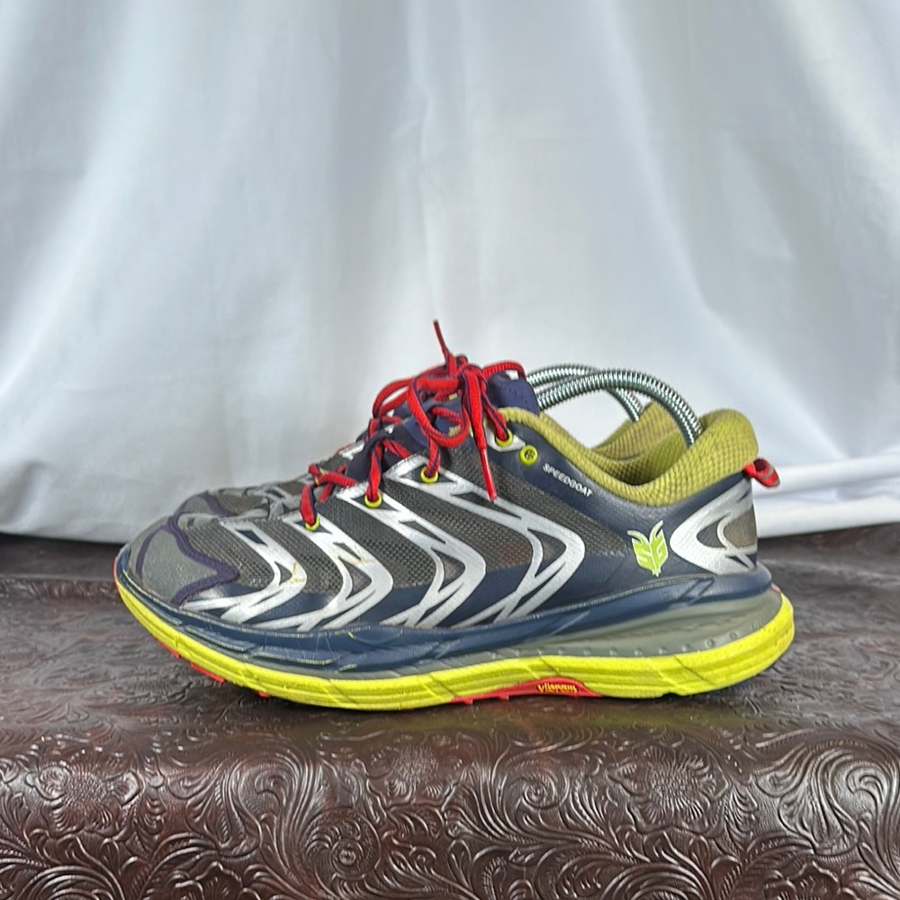 Hoka One One Athletic Shoes in Black, Yellow, and Red